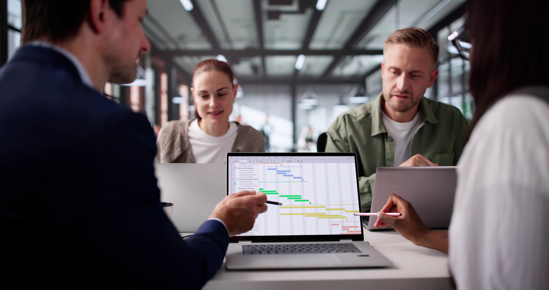 Multiracial Business Team Scheduling Projects